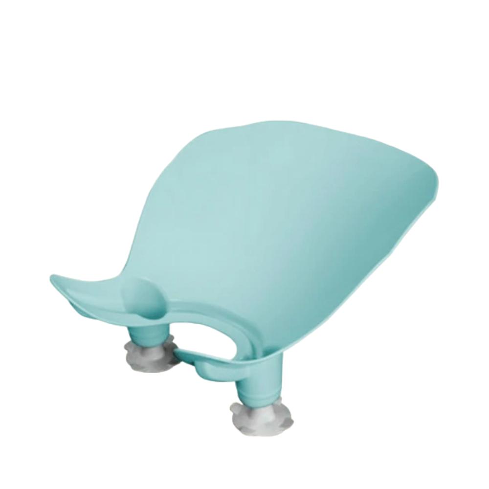 White Infant Washbasin Bath Seat, ergonomic and non-slip, provides secure support for safe baby bathing in sinks.
