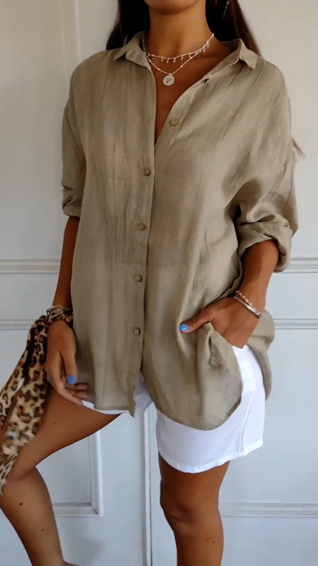 Stylish women's button-down shirt, new arrival for casual fashion and everyday versatility.