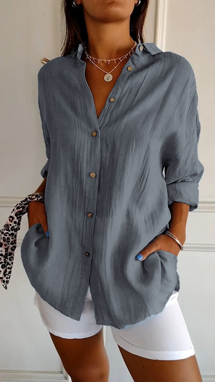 Versatile women's long sleeve button-down shirt, ideal for everyday fashion and comfort.