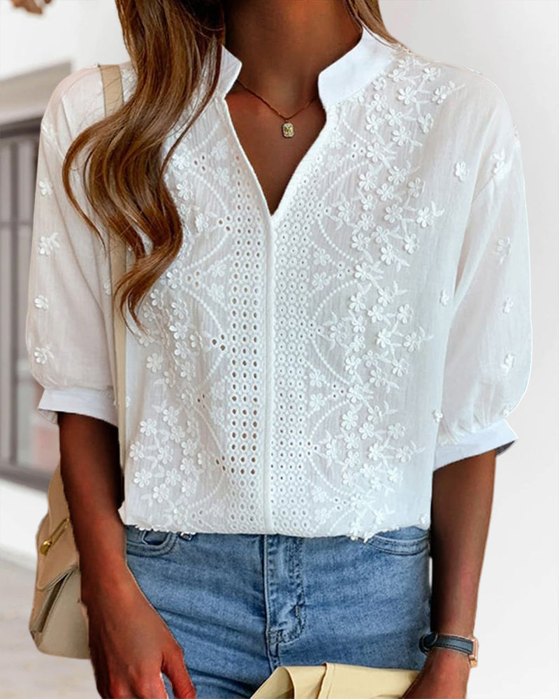 Summer-ready women's top: white V-neck blouse, lightweight with elegant puff sleeves
