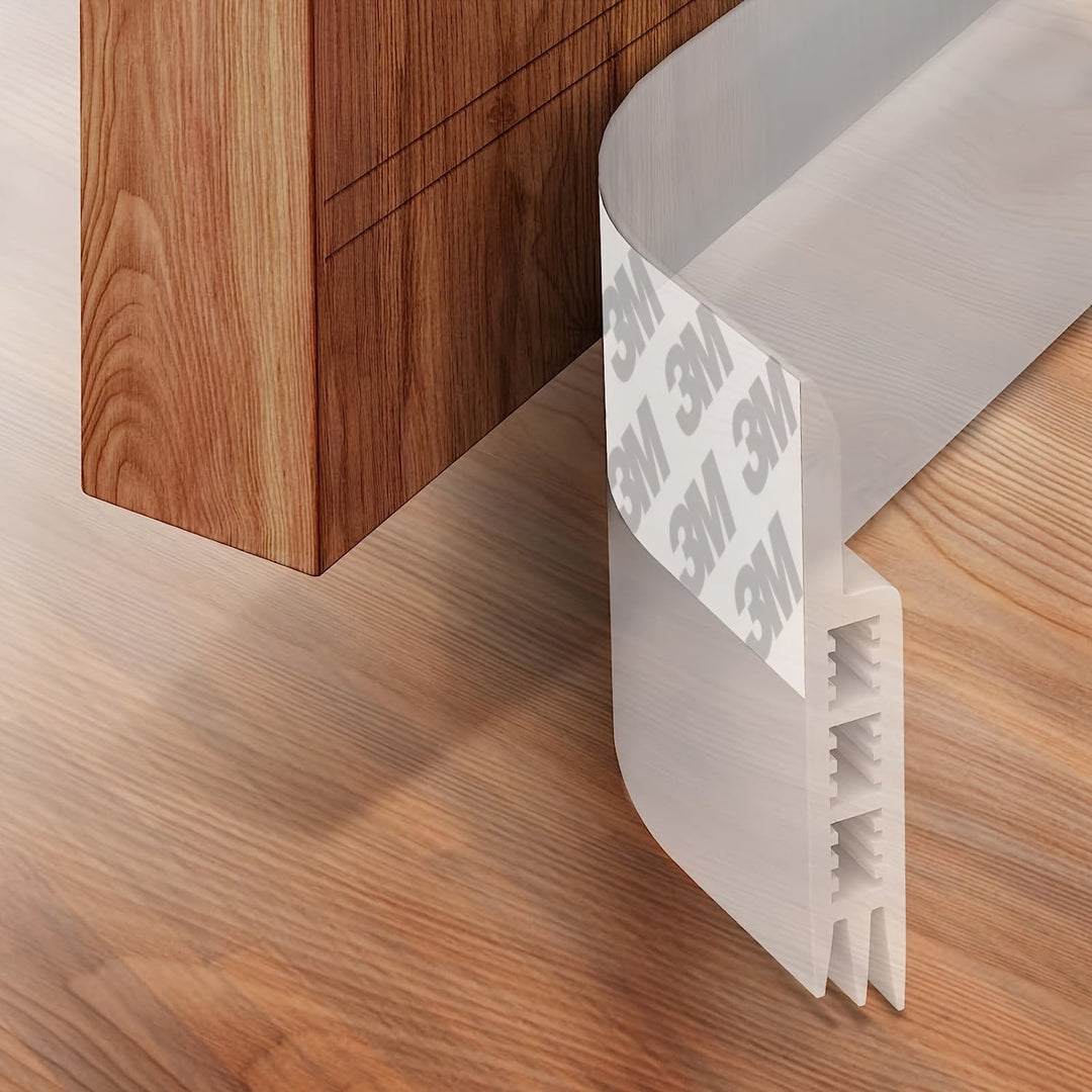 Transparent silicone door sweep with adhesive, sealing drafts for enhanced home comfort and quiet.