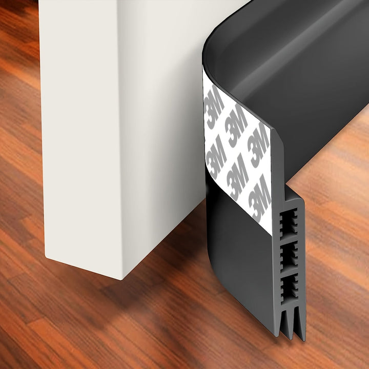 Gray silicone door bottom seal, an energy-saving solution for drafts and sound insulation.