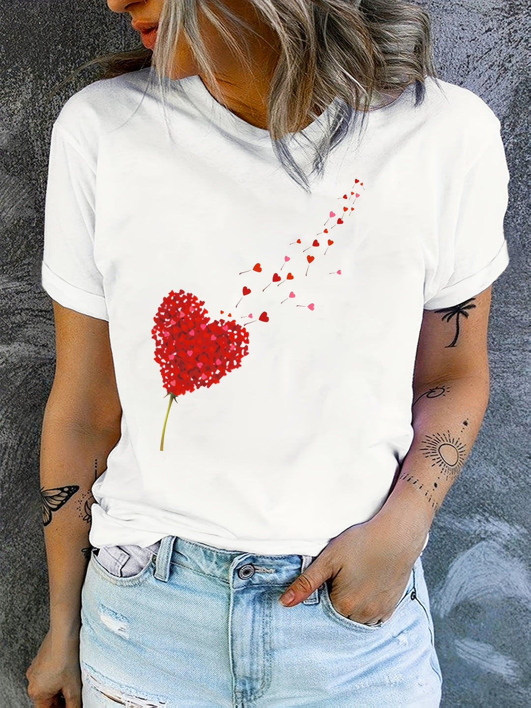 Comfy women's graphic tee featuring a unique heart floral print, short sleeve and round neck.