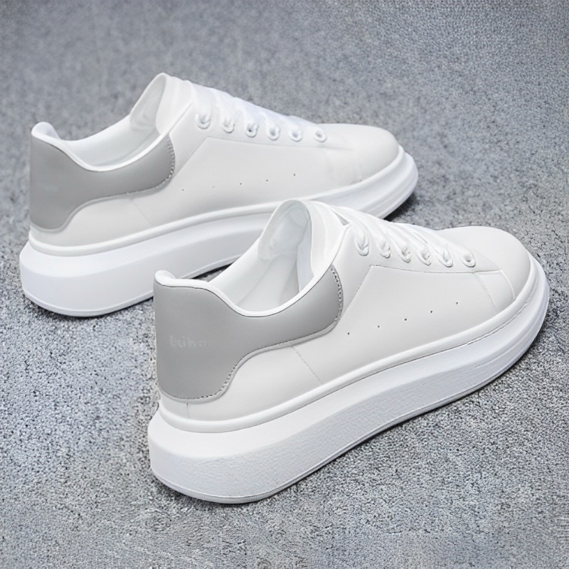 Black women's platform sneakers with elevated sole, ideal for versatile casual & fashion looks.