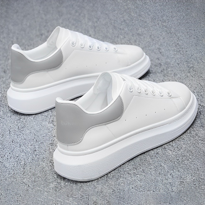 Black women's platform sneakers with elevated sole, ideal for versatile casual & fashion looks.
