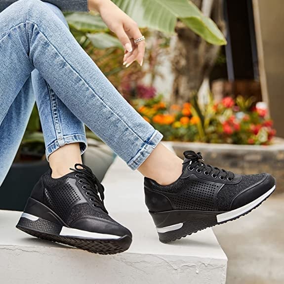 White women's elevated wedge platform sneakers, perfect for casual fashion and comfort