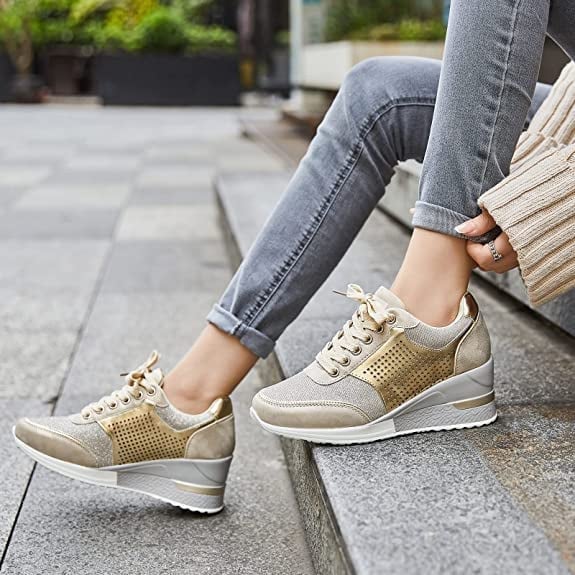 Stylish women's wedge platform sneakers in a neutral color, ideal for everyday wear