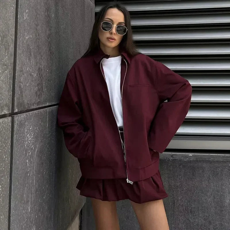 Casual lightweight wine red jacket with zip closure, ideal for autumn wear.