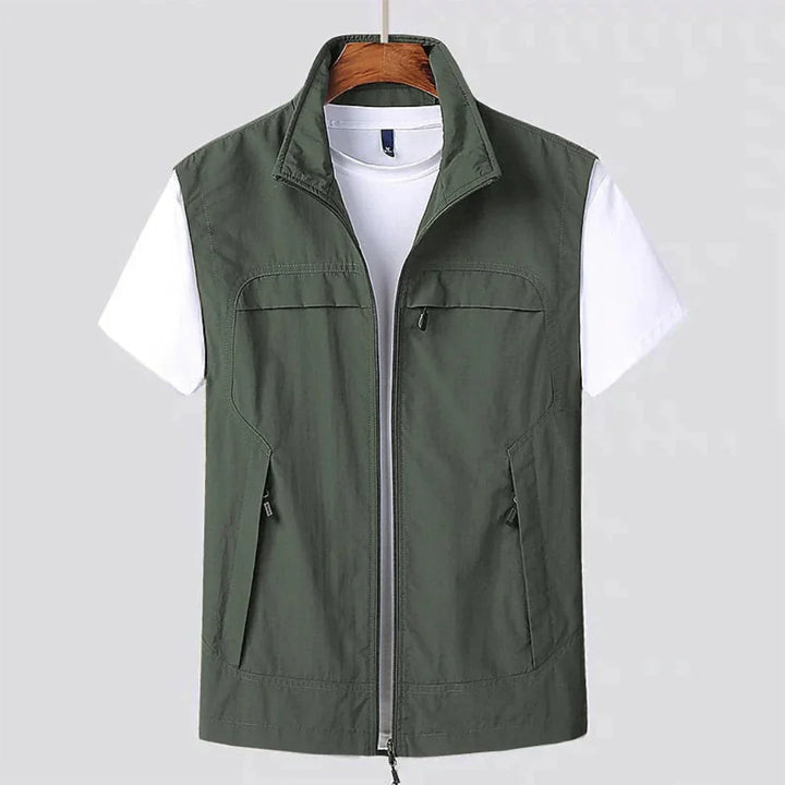 Lightweight men's travel vest with multiple pockets, breathable for active outdoor sports & adventures.