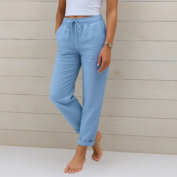 Stylish women's linen trousers with a comfortable elastic waistband, ideal for everyday summer wear.