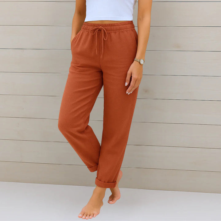 Detailed shot of pocket and stitching on women's stretch linen pants, emphasizing quality craftsmanship.