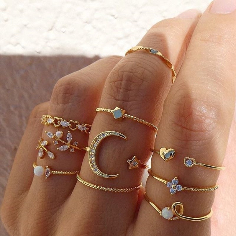Women's 10-pair gold & silver boho ring set. Stackable, versatile fashion jewelry for everyday wear.