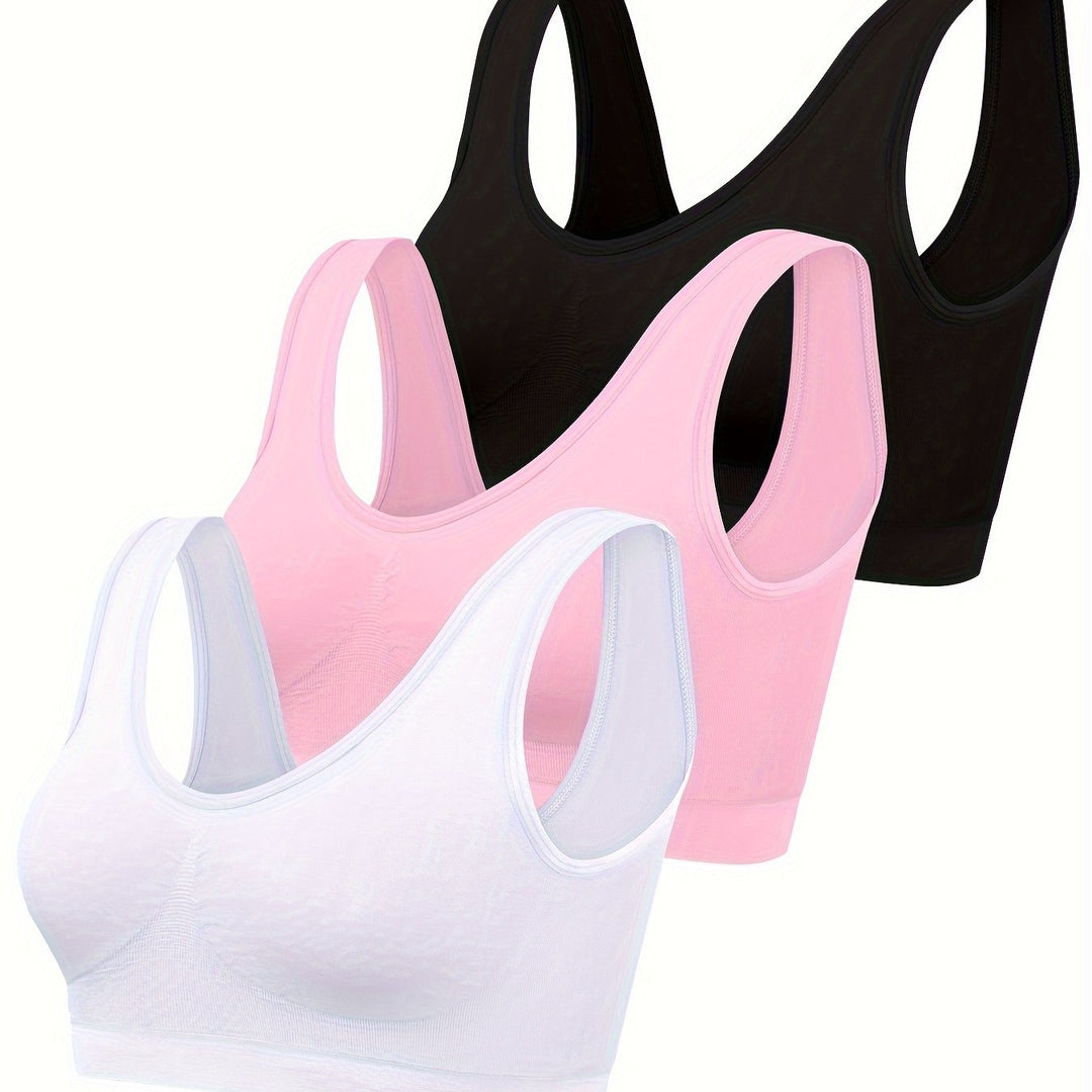 Women's 3-piece seamless activewear set: supportive sports bra, tank top, and athletic bottoms. Workout ready.