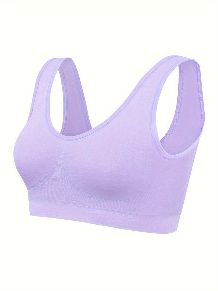 Durable women's seamless sports bra & tank top activewear set. Perfect for gym, running, or Pilates.
