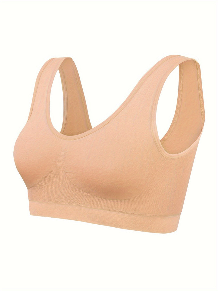 Women's seamless casual activewear set. Tank top, sports bra, and bottom for effortless style & comfort.