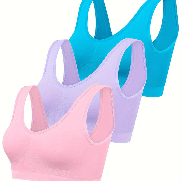 Athletic women's 3-piece set: seamless tank top, sports bra, and comfy leggings for training.
