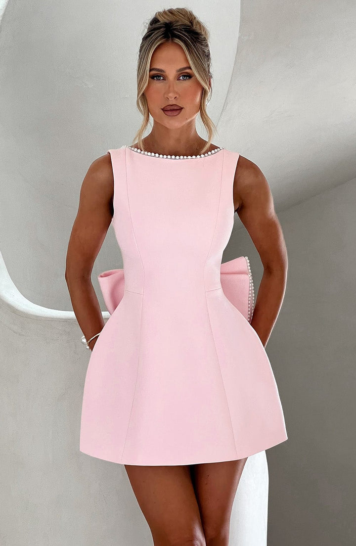 Women's A-line mini dress with elegant pearl trim, perfect for wedding guests & cocktail parties.