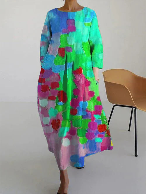 Casual women's long sleeve maxi dress featuring a vibrant abstract floral pattern