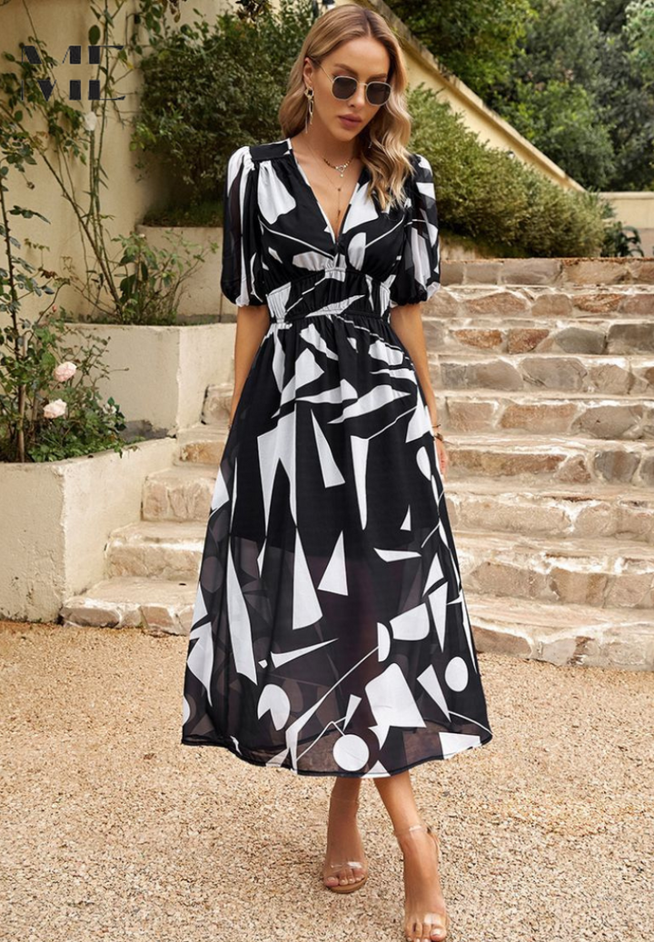 Front view of women's abstract print belted midi dress on white background. Keywords: midi dress, women's dress, abstract print, belted dress