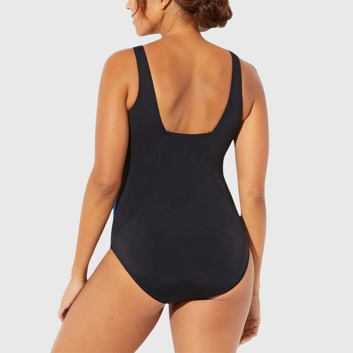 Stylish women's one-piece shaping swimsuit with a vibrant abstract print design