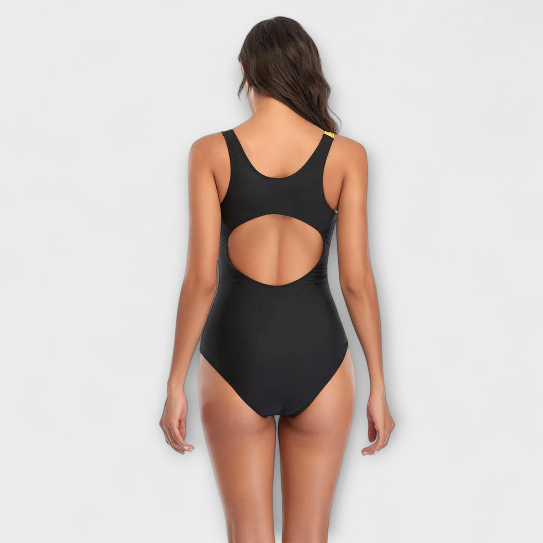 Comfortable women's color block one-piece swimsuit, ideal for swimming laps or lounging by the pool.