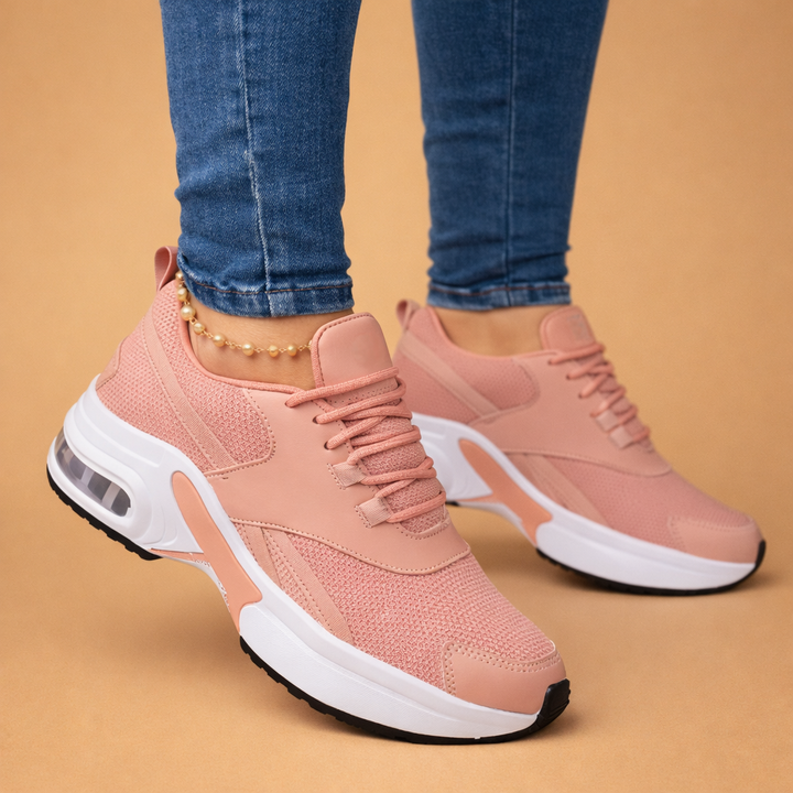Stylish women's athletic sneakers with air cushion comfort. Ideal for running, walking, and active sports fashion.