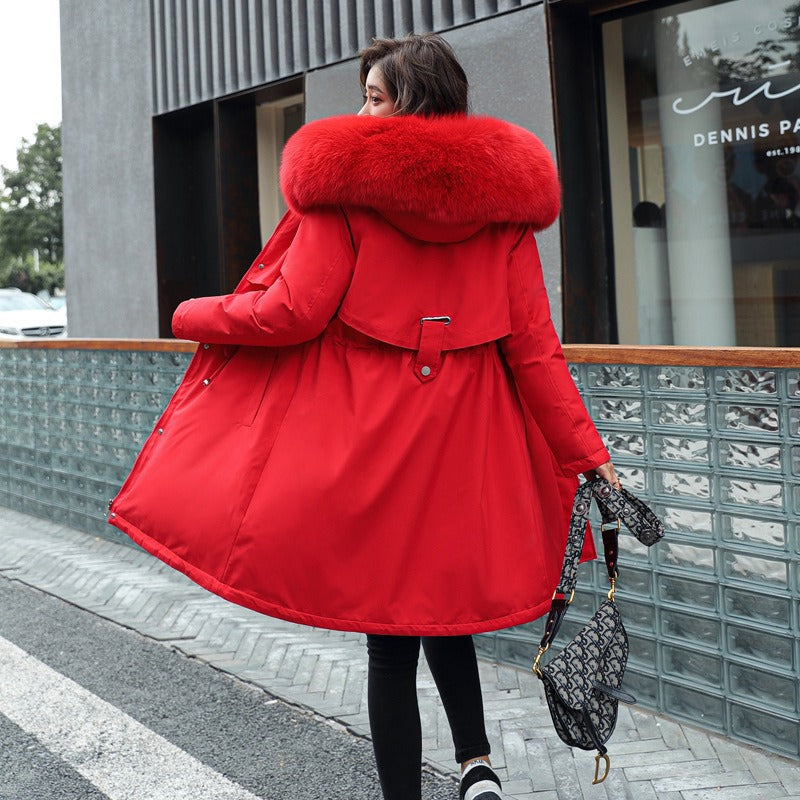 Black Amber women's hooded parka. Warm winter jacket for outdoor adventures & daily wear.
