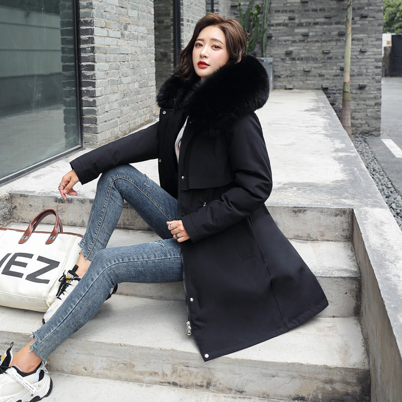 Beige women's Amber parka, a stylish and warm long winter coat for daily wear & cold weather.