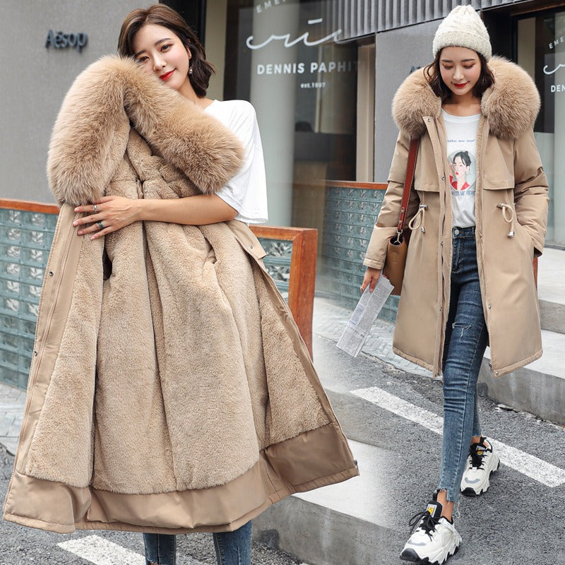 Amber women's warm winter parka with hood. A comfortable and stylish long coat for ladies in cold weather.
