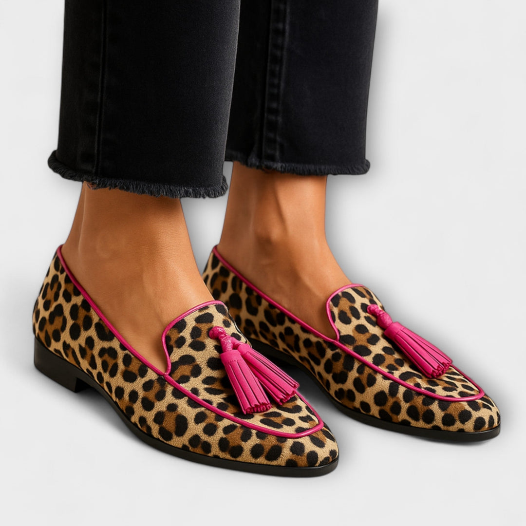 Women's animal print tassel loafers, stylish slip-on shoes for casual wear, comfortable fashion statement.