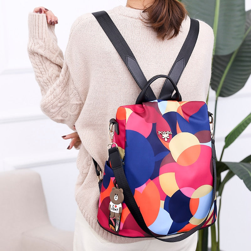 Women's anti-theft backpack, water-resistant PU leather, multiple pockets for daily use & travel.