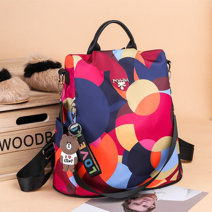 Anti-theft laptop backpack for women, water-resistant, secure compartment, ideal for work & travel.