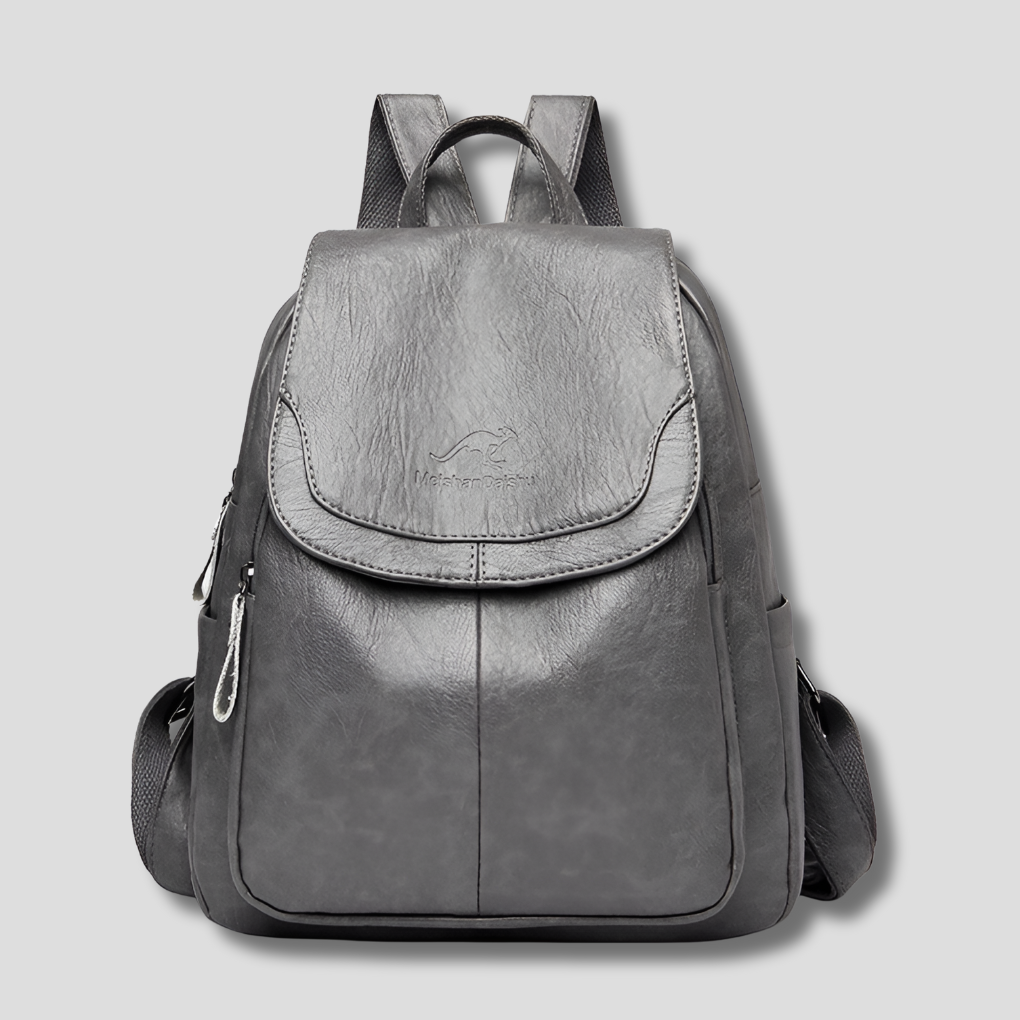 Sophisticated women's anti-theft backpack, black embossed leather, perfect for work or leisure.