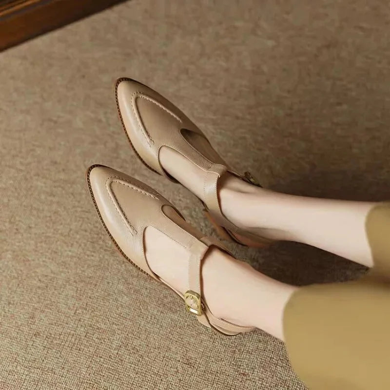Apricot women's flat leather loafers with elegant buckle detail for classic everyday wear