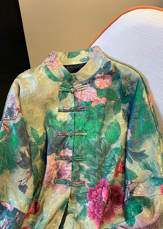 Women's stylish autumn coat featuring unique Chinese print and classic buttons. Elegant fall outerwear.