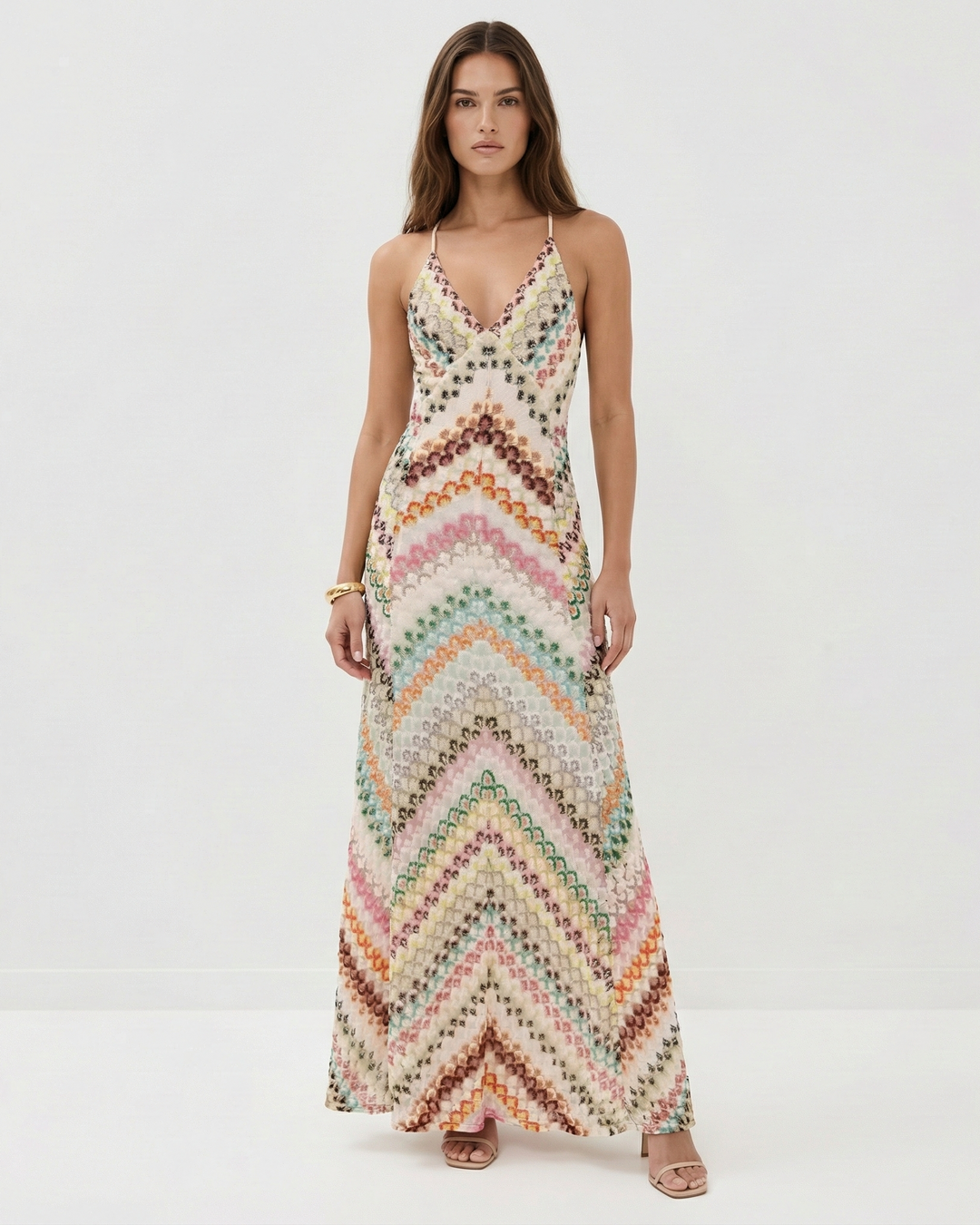 Women's backless V-neck striped maxi dress, elegant for summer, evening parties, or resort wear.