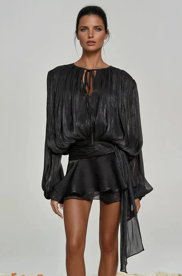 Detail of the unique balloon sleeve design on a women's festive ruffle mini dress, perfect for parties