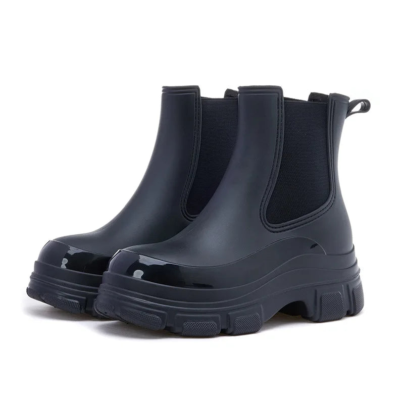 Stylish beige women's ankle boots featuring a chunky sole and easy slip-on design.