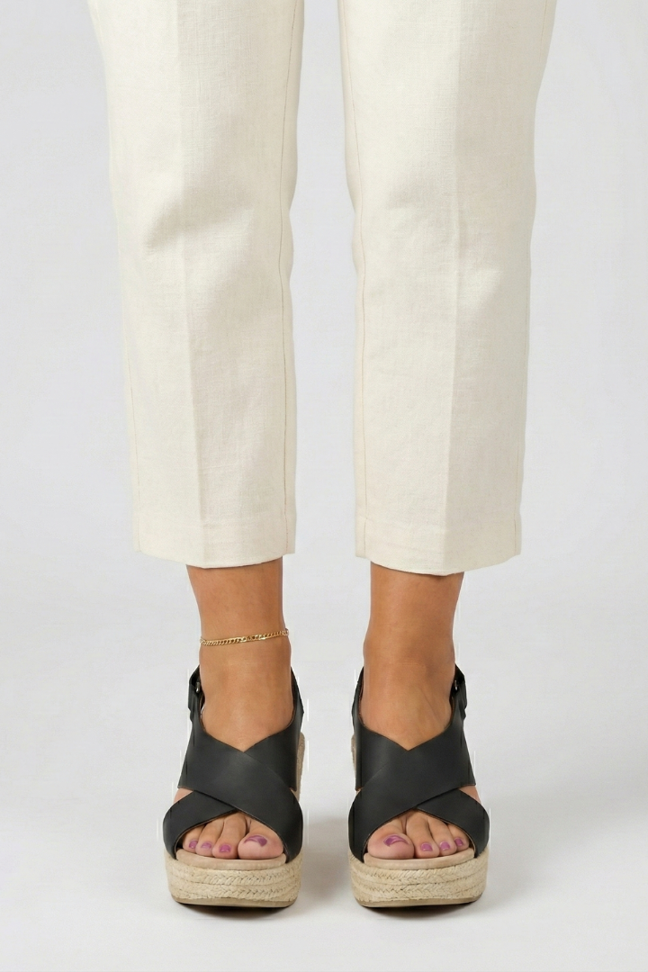 Stylish black wedge crossover slingback sandals for women, offering comfortable heel height