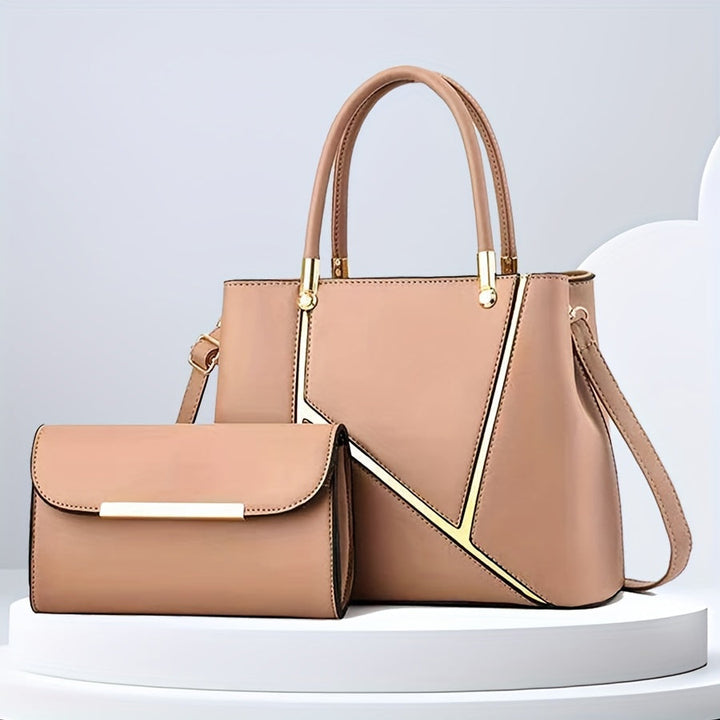 Women's black 2-piece handbag set. Stylish tote and matching crossbody purse for daily elegance.