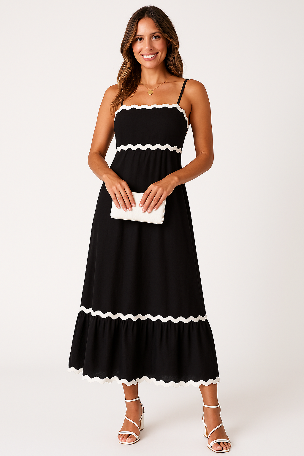 Women's black A-line maxi dress with spaghetti straps, perfect for summer fashion.