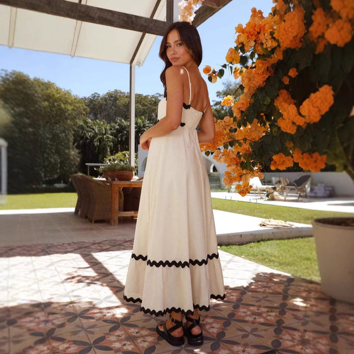 Sleeveless A-line maxi dress for women with thin spaghetti straps, a versatile summer dress.