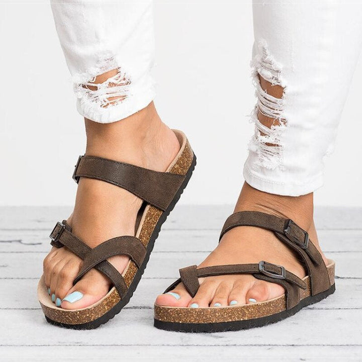 Women's black adjustable comfort sandals with strappy design for all-day supportive summer walking footwear.