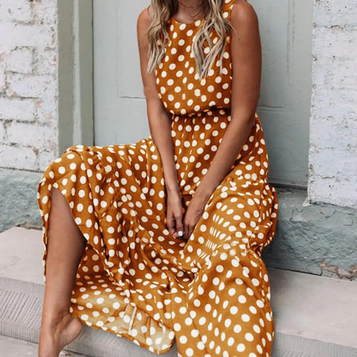 Women's black and white polka dot sleeveless midi dress, casual and comfortable for summer days