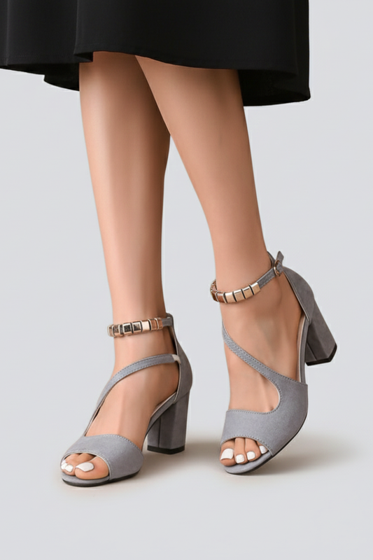 Women's block heel crisscross ankle sandals in a neutral color, suitable for various styles