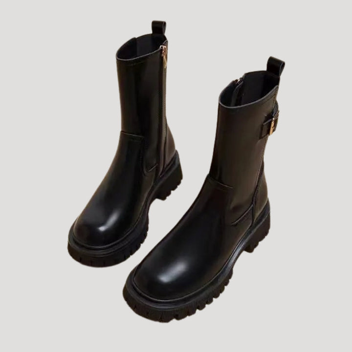 Women's black chunky mid-calf boots, perfect for spring fashion and casual wear.