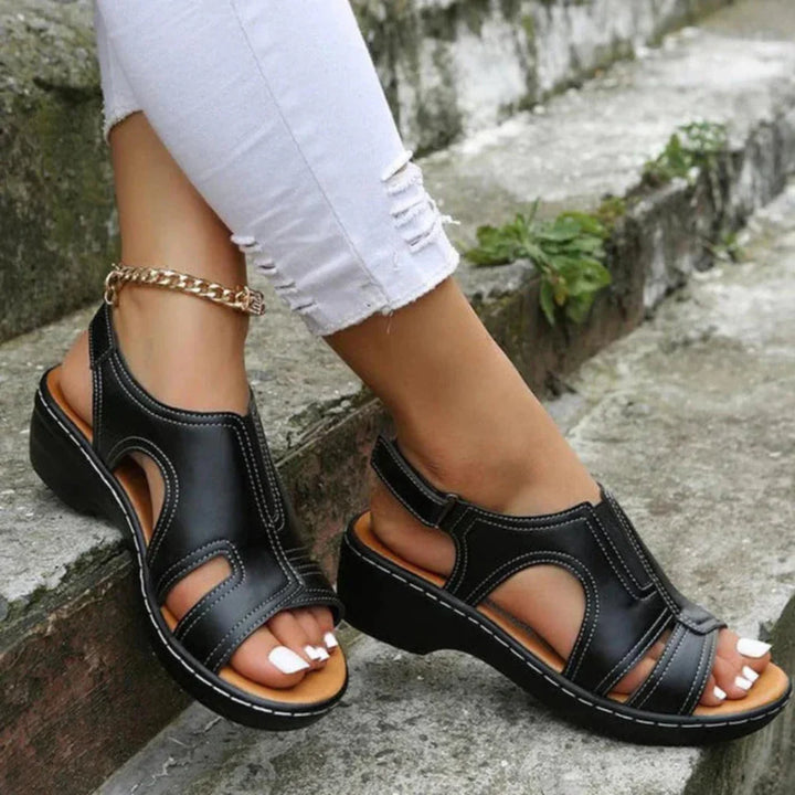 Spring women's casual sandals, featuring a platform sole and intricate cutout design.