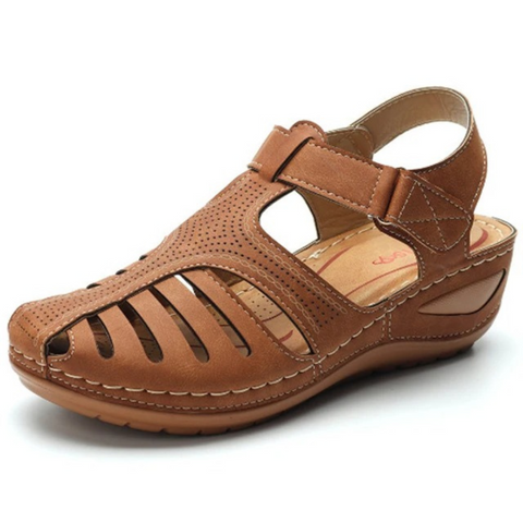 Side profile of women's black cutout walking sandals, showcasing comfortable footbed and open toe