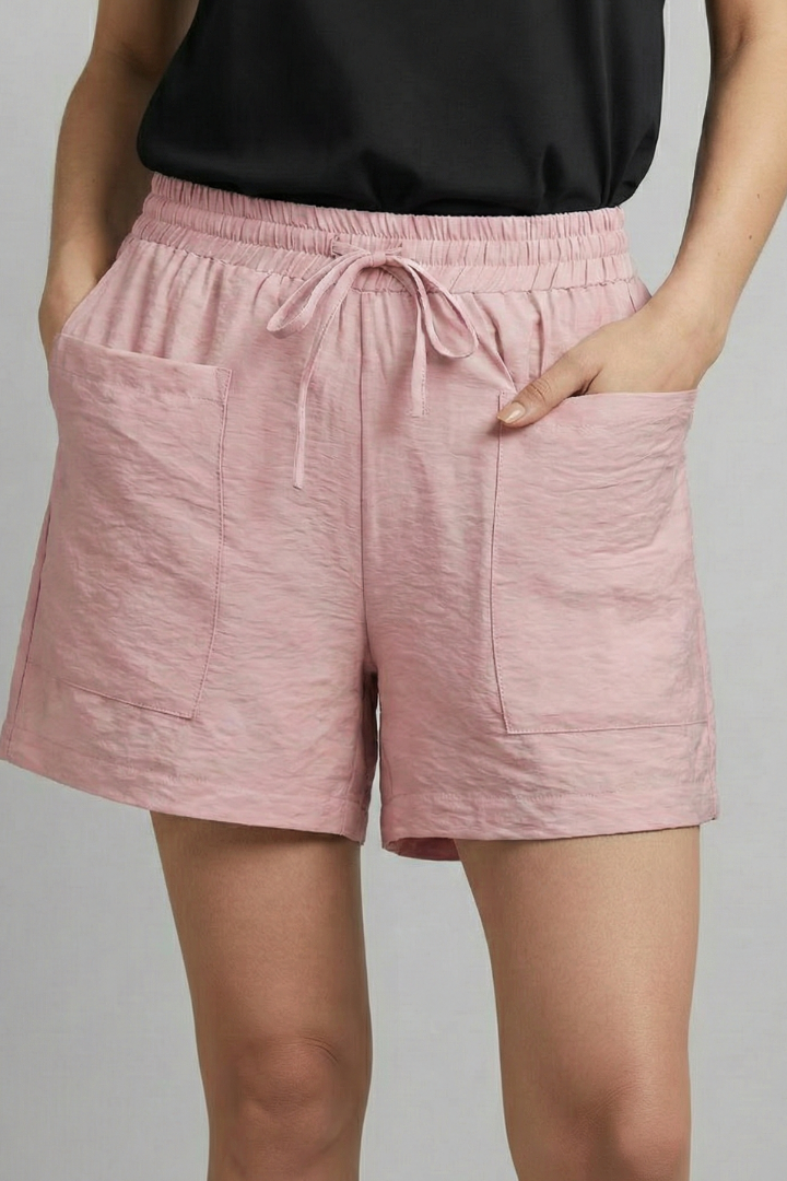 Women's casual drawstring shorts in a vibrant blue color, perfect for beach days or relaxed loungewear