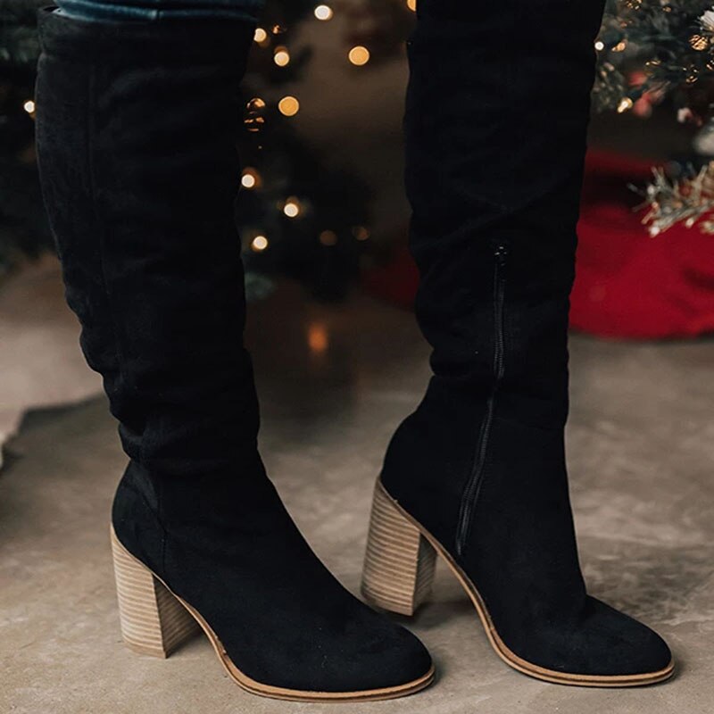 Fashionable women's dark brown chunky heel thigh-high boots, perfect for winter and fall outfits
